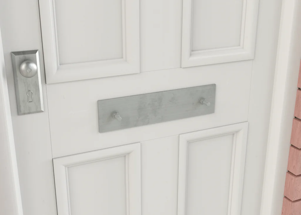 Letterbox from inside showing security plate fittings